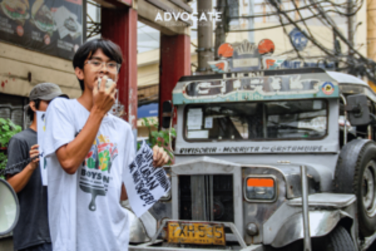 FEU student-activists stand with jeepney drivers amidst transport strike
